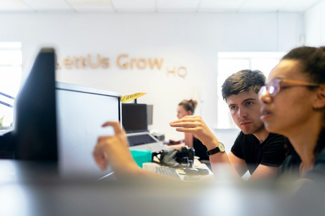 diverse students in english coding class