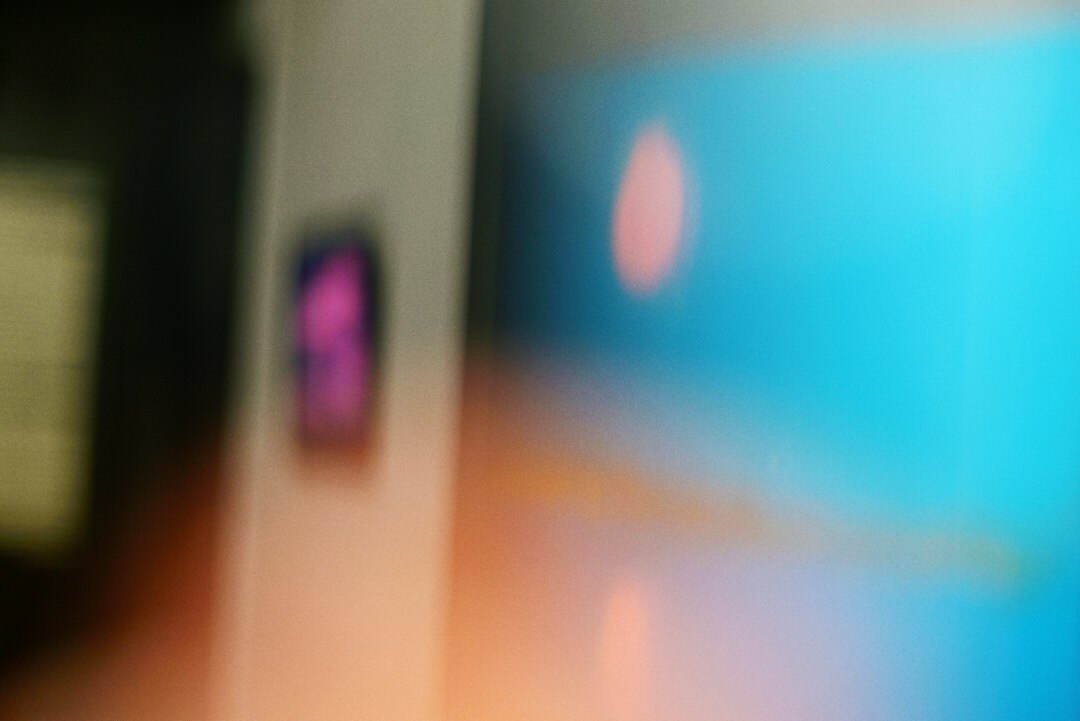 Close up of laptop screen showing colorful programming code