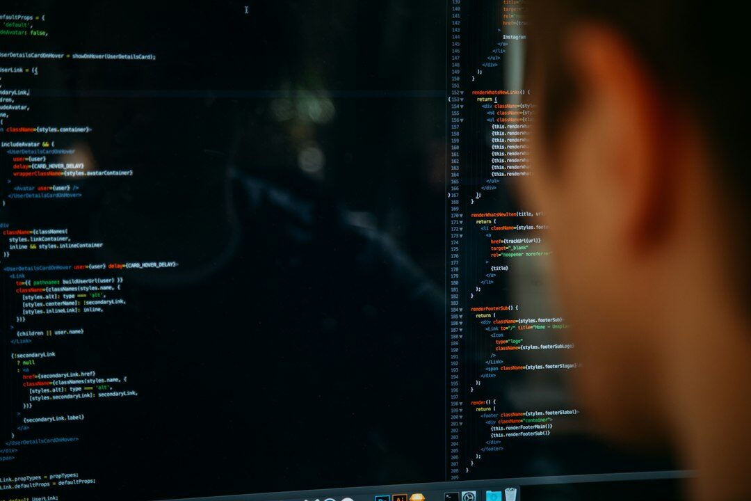 person coding at night